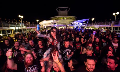 Black metal and pina coladas … revellers enjoy the music.