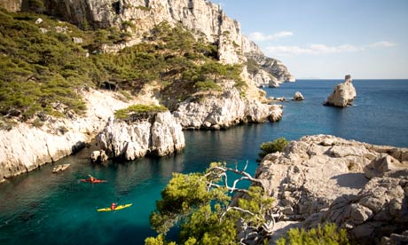 Kayakers in Les Calanques near Cassis, France.