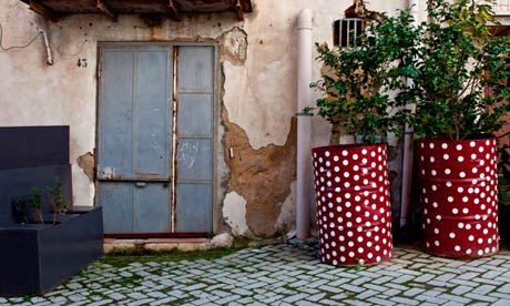 Red and white polka dots in back street