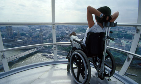 Disabled tourist enjoys the view from the London Eye