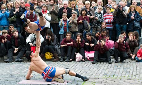 If Emma just keeps practising … street performers in Covent Garden, London