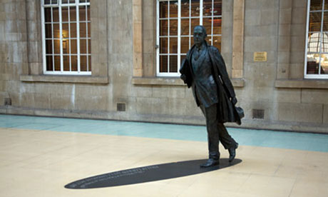 Philip Larkin statue, railway station concourse, Hull, Yorkshire, England