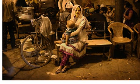 Indian woman at food stall