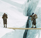 Everest sherpas cross log bridge, Western Cwm