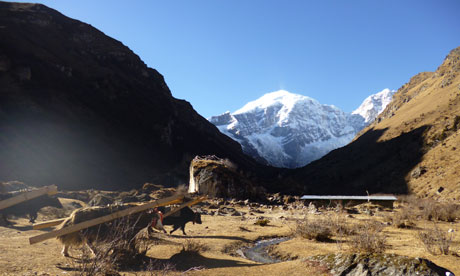 Jomolhari base camp and a ruined dzong on a rock
