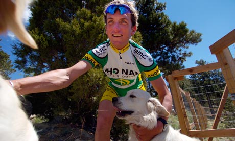 Tyler Hamilton plays with his dogs, west Boulder, Colorado