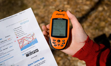 A hand-held GPS unit being used in geocaching