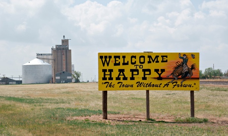 Road sign welcoming people to Happy, Texas, USA