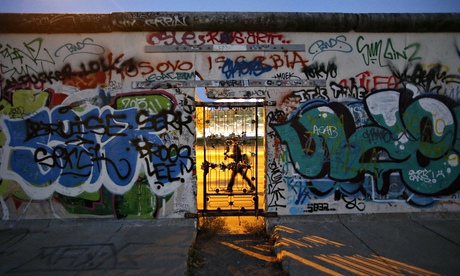 A door at a painted section of the East Side Gallery in Berlin