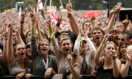 Festival crowd with hands raised