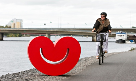 Cycling by the river in central Umea