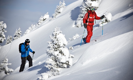 Guillaume cuts out a trail on a split board.