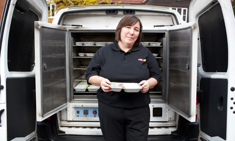 Meals on wheels lady Rhona Johnson about to deliver a home-cooked meal.