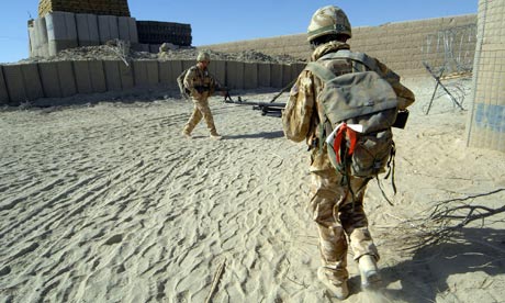 Soldiers from Coldstream Guards return to base after patrol in Central Helmand province