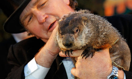 Groundhog handler John Griffith holds famed weather prognosticating groundhog 