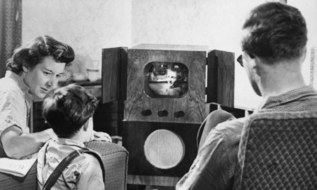 1955: A family watching television at home