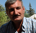 Syrian Colonel Riad Assad at a refugee camp in Hatay, Turkey