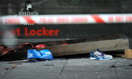 Debris outside a Foot Locker store in Brixton after it was broken into by looters