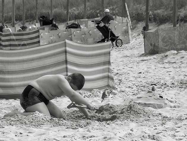 Boy on the beach at Dąbki, Poland