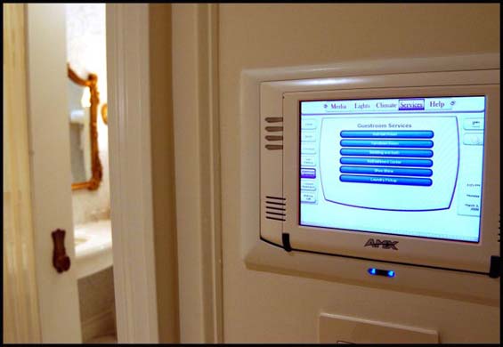 A bedroom touchscreen in the Plaza hotel