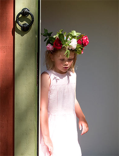 Young girl in flowered headress