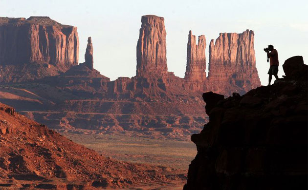 A photographer in Monument Valley, Arizona