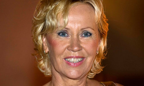 Faltskog, former member of Swedish pop group ABBA, smiles in Stockholm
