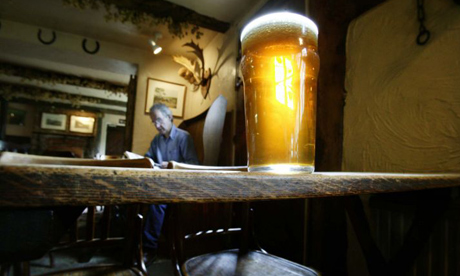 Man reading in pub