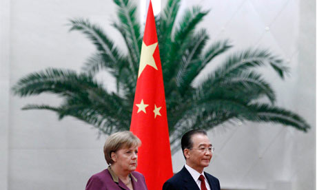 Angela Merkel attends an official welcoming ceremony with Chinese Premier Wen Jiabao.