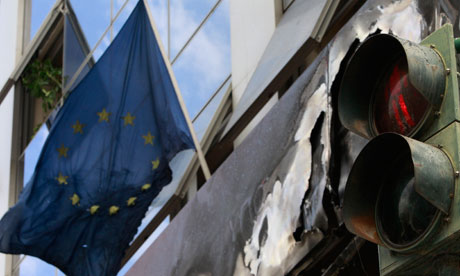 A bomb-damaged branch of the Administrative Reform ministry in Athens, 9 April 2012