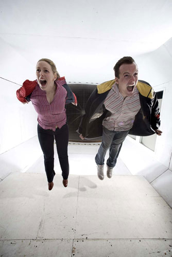 Leading lights: STEM Ambassadors Clare Wood and Ben Evans in a giant wind tunnel