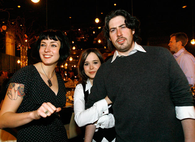 Director Reitman poses with cast member Page and writer Cody at pre-Oscar party in Los Angeles