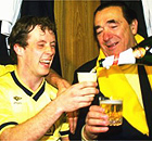 Les Phillips of Oxford United celebrates with Robert Maxwell after their victory in the 1986 Milk Cup semi-final