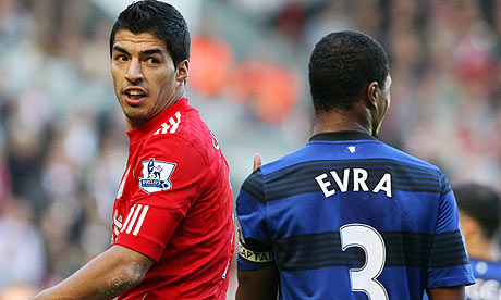 Luis Suarez and Patrice Evra