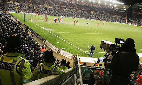 A Sky cameraman in action at a Premier League game between Liverpool and Birmingham City at Anfield