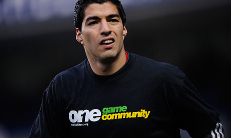 Suarez in Kick It Out t-shirt
