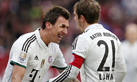 Bayern's Mario Mandzukic of Croatia, left, and Bayern's Philipp Lahm