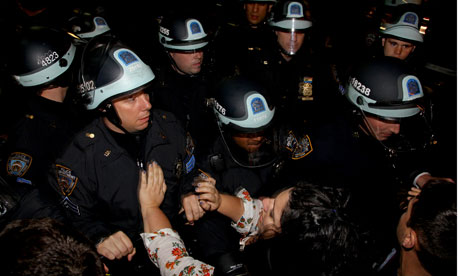 Demonstrators clash with police at the encampment at Zuccotti Park 