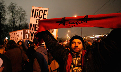 A protester holds up a scarf in Bolotnaya Square. Moscow.