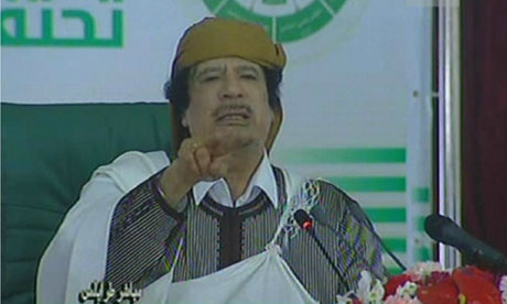 Libyan leader Muammar Gaddafi addresses loyalists of his regime during a public rally in Tripoli