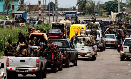Ivory Coast troops loyal to Alassane Ouattara mass outside Abidjan