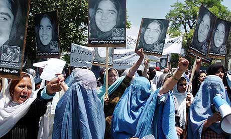 Afghan women shout slogans during a demo
