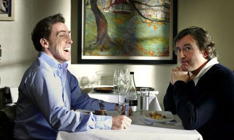 Rob Brydon and Steve Coogan at restaurant table in The Trip.
