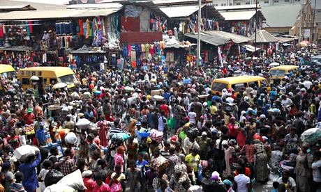People gather at Balogun market in central Lagos