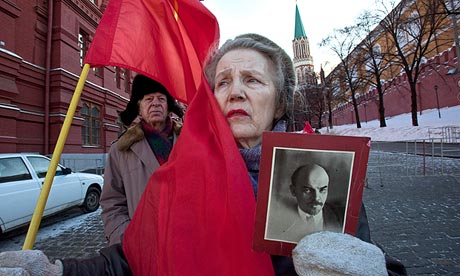 Russian Communists supporters wait to visit the mausoleum of Lenin at Moscow's Red Square