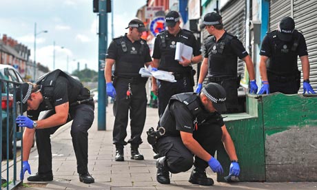 Police in Birmingham search for evidence