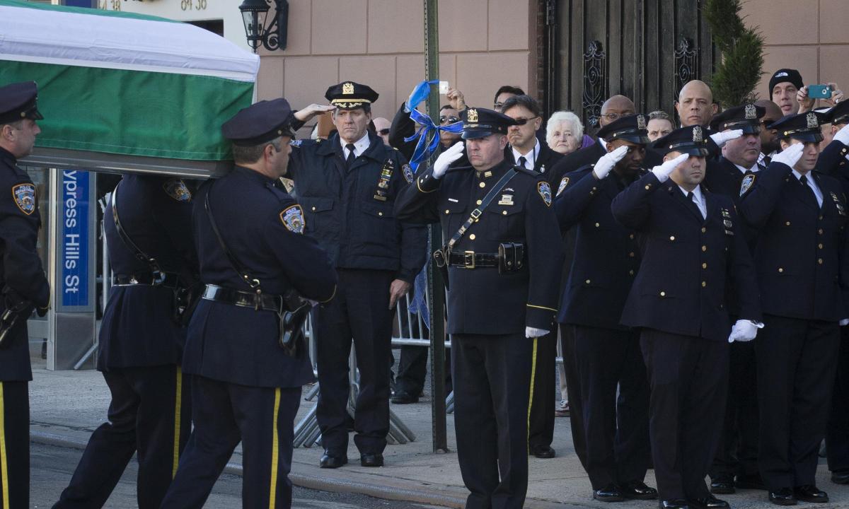 Joe Biden: Our hearts ache for Rafael Ramos's family - video