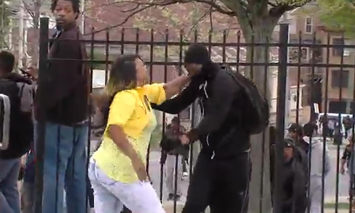 Baltimore mother praised by police for dragging son out of riots |  Baltimore | The Guardian