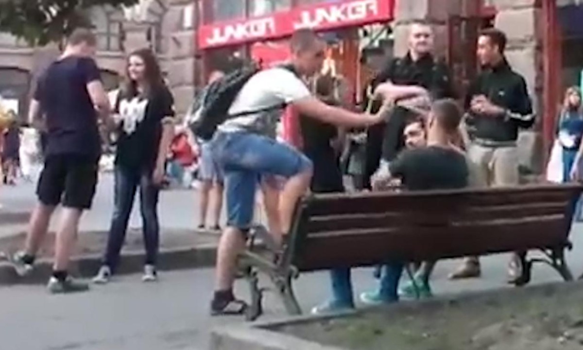 Gay couple kicked and pepper sprayed by far-right mob in Kiev | Ukraine |  The Guardian