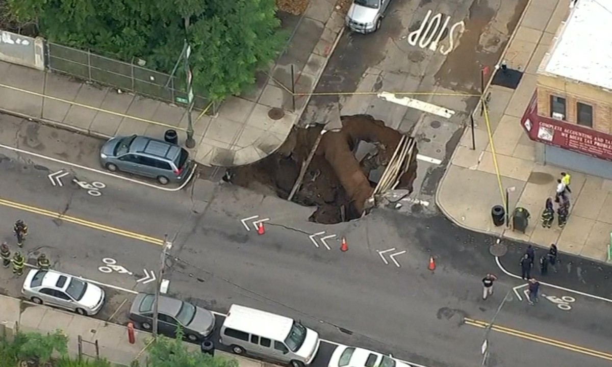 Sinkhole Swallows Brooklyn Intersection Video Us News The Guardian